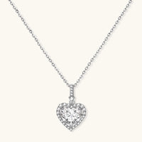 Sterling silver heart pendant necklace with brilliant moissanite center stone and halo setting on delicate chain