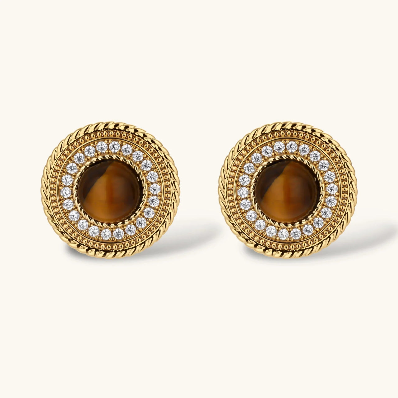 Gold-plated circular pendant necklace and matching earrings with natural stone centers and ornate rope detailing
