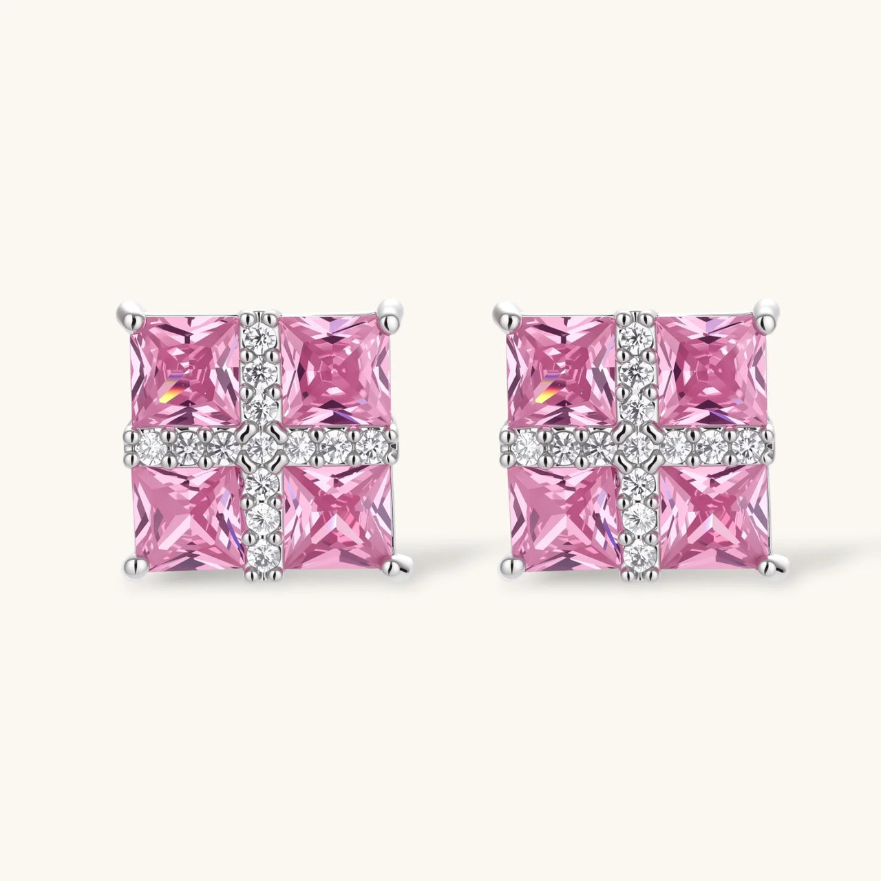 White gold plated jewelry set with pink cubic zirconia stones in geometric cross design, featuring Y-necklace and square stud earrings
