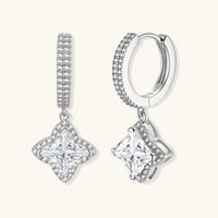 Sterling silver huggie hoops with geometric diamond-shaped moissanite dangles featuring pavé crystal details