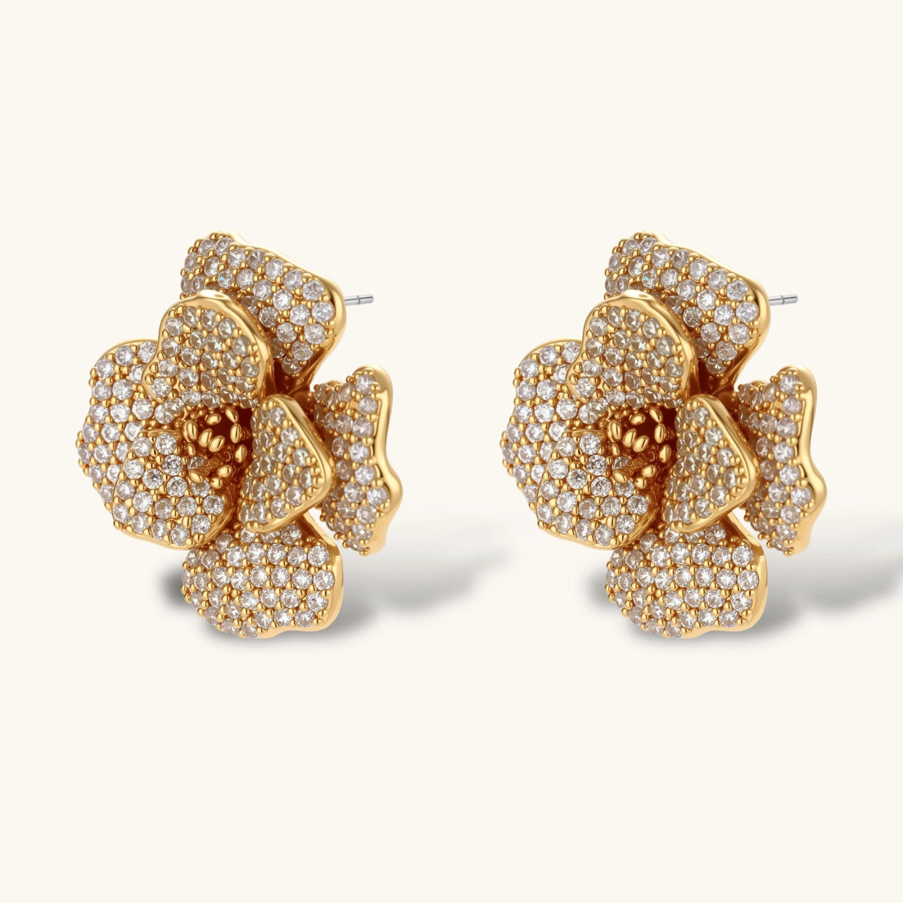 14K gold-plated flower jewelry set with zirconia crystals, featuring dimensional petal necklace and matching earrings