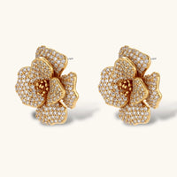 14K gold-plated flower jewelry set with zirconia crystals, featuring dimensional petal necklace and matching earrings