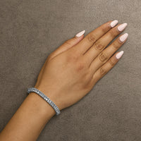 14K Gold 3.0 Cttw Princess Cut Quad Invisible Set Tennis Bracelet (H-I Color, SI1-SI2 Clarity) - 7”