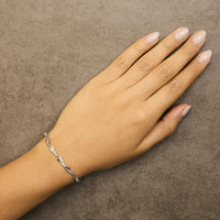 10k White Gold Diamond Accent Spiral Link Bracelet (H-I Color, I3 Clarity) - 7.5