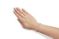 10K Yellow Gold 3.00 Cttw Round-Cut and Baguette-Cut Diamond 'XOXO' Floral Design 7.50