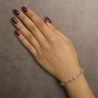 10K Rose and White Gold 1/4 Cttw Diamond Infinity Loop and Swirl Link Bracelet
