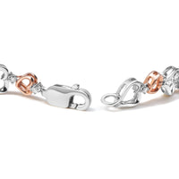 14K Rose Gold Plated .925 Sterling Silver 1/4 Cttw Diamond Heart Link Bracelet (I-J Color, I2-I3 Clarity) - Size 7