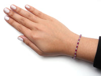 .925 Sterling Silver Oval Ruby and 1/4 Cttw Diamond Link Bracelet - Size 7.25