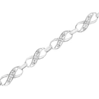 .925 Sterling Silver Prong Set Diamond Accent Ribbon and Infinity Link Bracelet (I-J Color, I3 Clarity) - 7.25