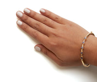 14K Gold Alternating Trillion Tanzanite and 1/3 Cttw Diamond Bangle Bracelet - Size 7