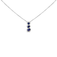 .925 Sterling Silver Created Blue and White Sapphire 3 Stone Swirl Pendant Necklace