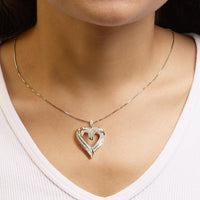 .925 Sterling Silver 3/4 Cttw Round and Baguette-Cut Diamond Open Heart 18