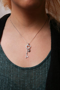.925 Sterling Silver 1/4 Cttw Diamond Lock & Key heart 18