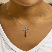 .925 Sterling Silver 1/4 Cttw Blue Diamond Ribbon Swirl over Cross Pendant Necklace (Blue Color, I2-I3 Clarity) - 18