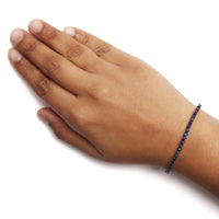 .925 Sterling Silver 5 3/4 Cttw Round Created Blue Sapphire Tennis Bracelet - 7.25