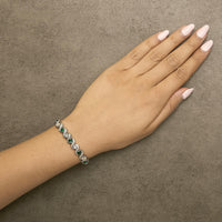 .925 Sterling Silver Created Emerald and Diamond Twist S Link Bracelet