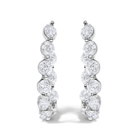 14K White Gold 3 3/4 Cttw Graduating Diamond Oval Hoop Earrings