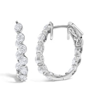 14K White Gold 3 3/4 Cttw Graduating Diamond Oval Hoop Earrings