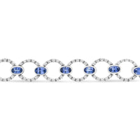 18K White Gold 6 Cttw Diamond and 5x3mm Oval Blue Sapphire Openwork Circle Link Bracelet (F-G Color, SI1-SI2 Clarity) - Size 7