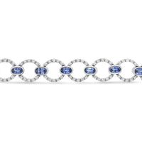 18K White Gold 6 Cttw Diamond and 5x3mm Oval Blue Sapphire Openwork Circle Link Bracelet (F-G Color, SI1-SI2 Clarity) - Size 7