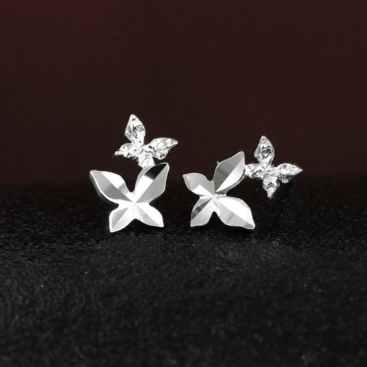 Elegant and Stylish Earrings Featuring a Multi Faceted Butterfly Silhouette in Minimalist 925 Sterling Silver Stud Earrings - KIAHMILLA