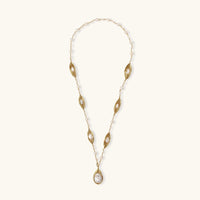 Golden Leaf Baroque Necklace featuring freshwater pearls and gold-plated leaves for a stunning look.