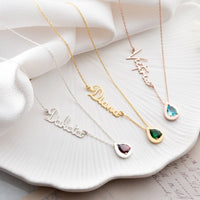 Personalized Cursive Name & Birthstone Necklace in various designs with birthstones showcasing unique fashion charm.