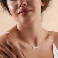 Personalized Cursive Name Necklace worn by a woman, featuring the name 'Danielle' in elegant cursive design.