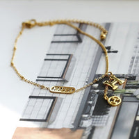 Titanium steel and 18k gold letter H tassel anklet - KIAHMILLA